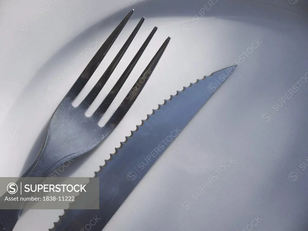 Knife and Fork on Plate