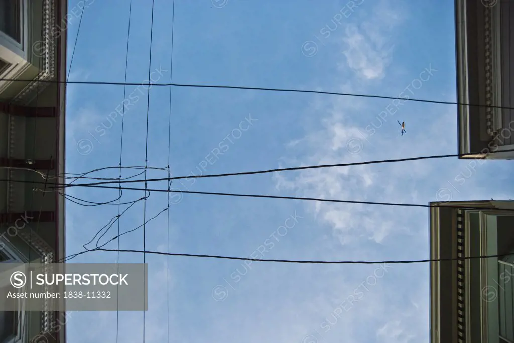 Roofs, Wires, Sky and Helicopter