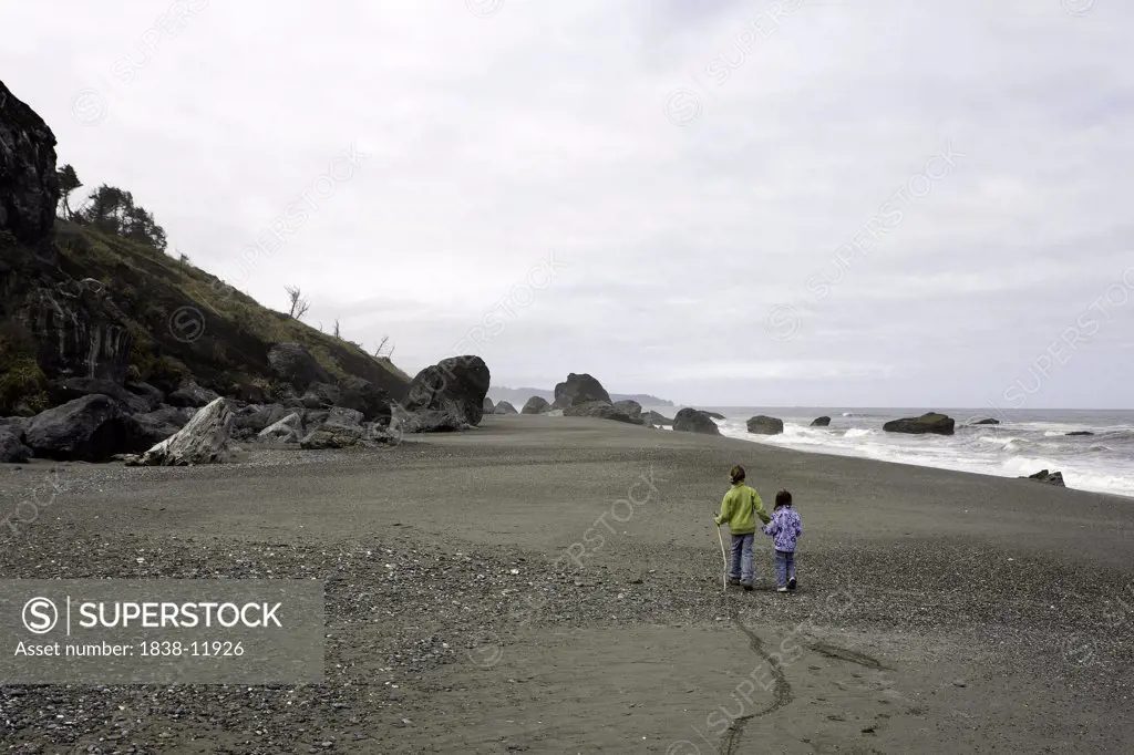 Two Young Girls Walking on Ocean Beach, Redwood National Park, California, USA