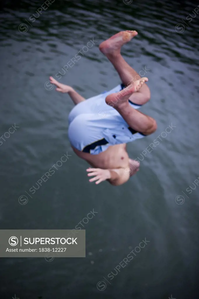 Man Flipping into Water