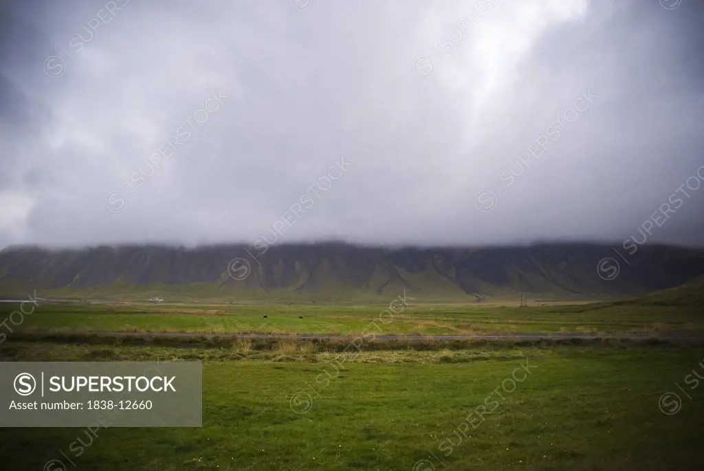 Farm Land in Valley Under Cloudy Sky, Iceland