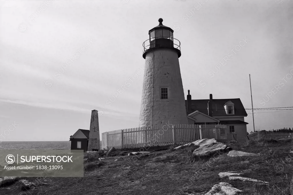 Lighthouse and Shore, Maine, USA