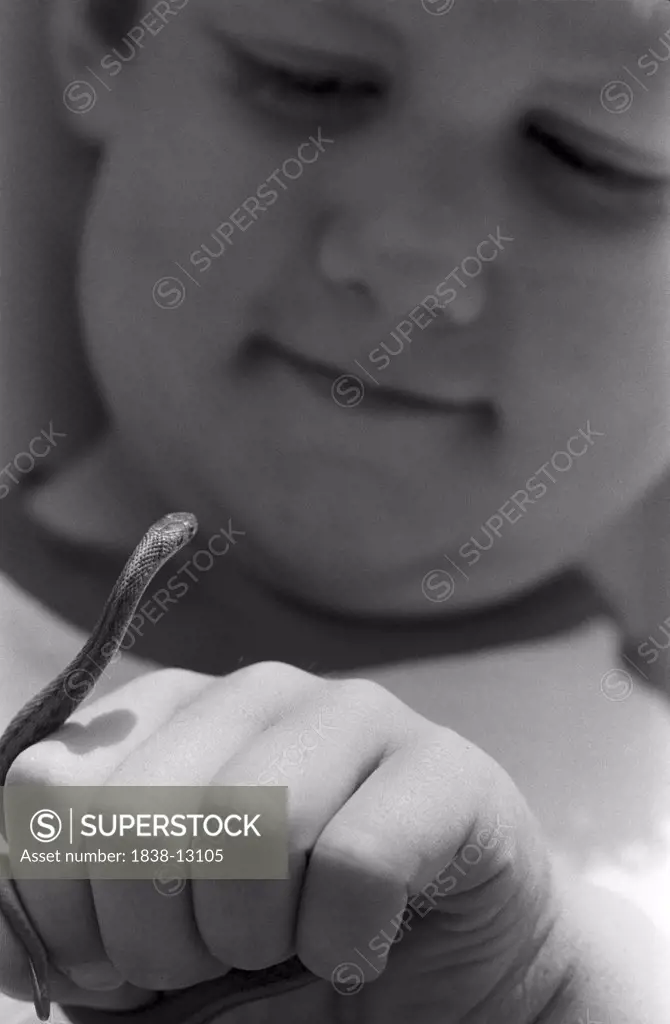 Boy Holding Snake