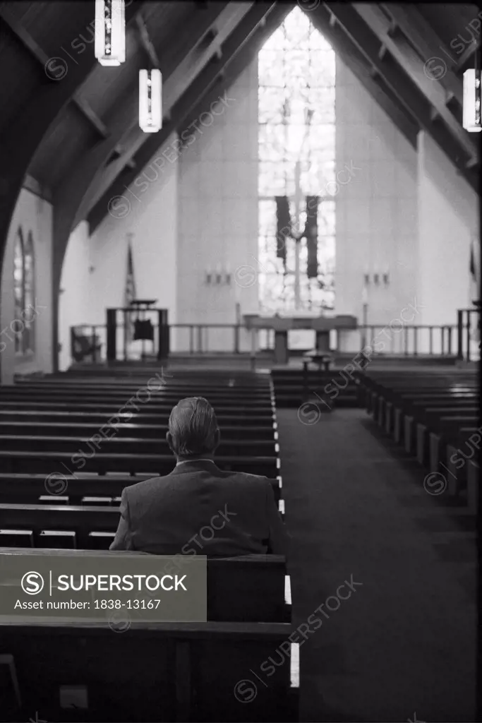 Man Sitting Alone in Church, Rear View