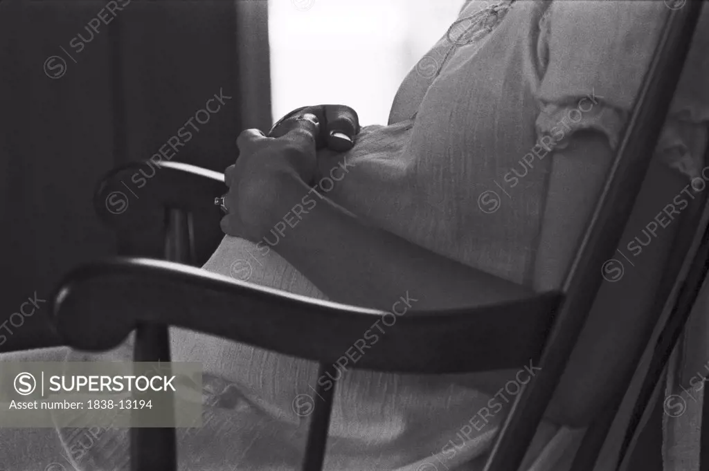 Pregnant Woman With Hands on Belly