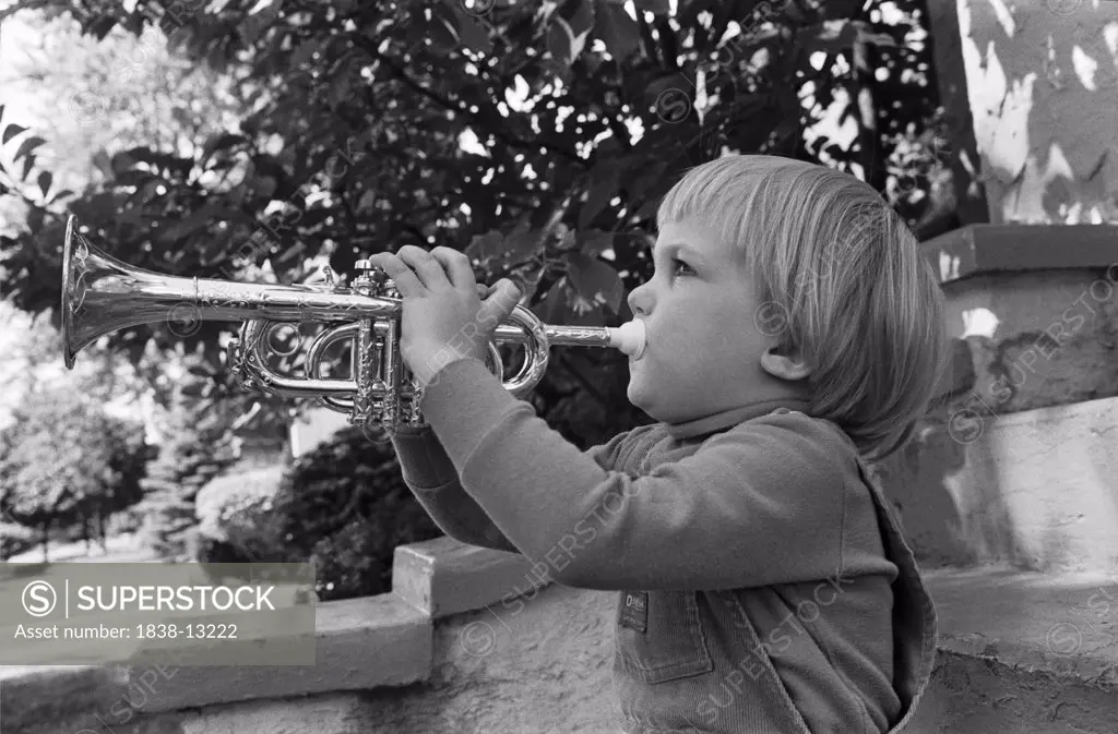Young Boy Playing Trumpet