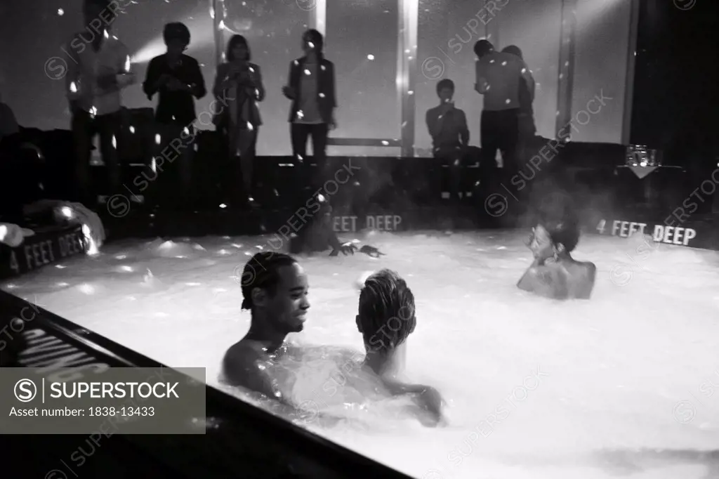 Group of People in Jacuzzi in Nightclub, New York City, USA