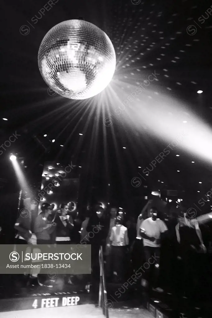 Crowd and Mirror Ball in Nightclub, New York City, USA