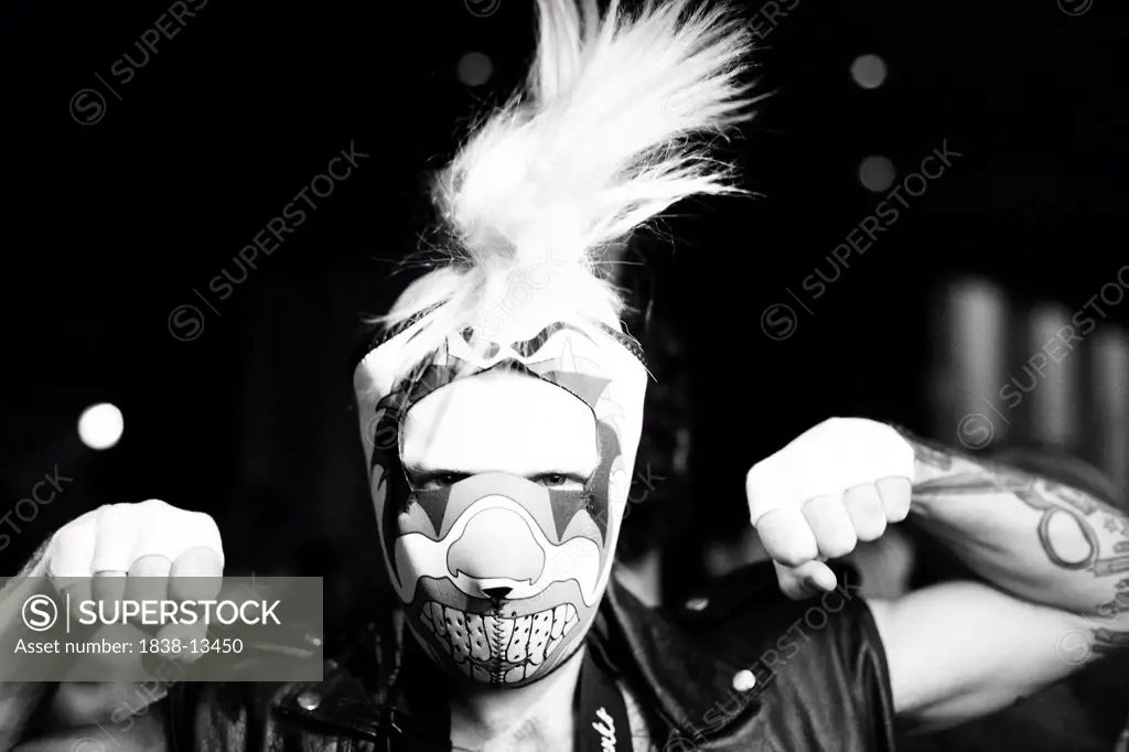Man Wearing Mask in Nightclub, New York City, USA