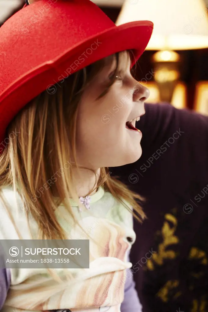 Young Girl With Red Hat