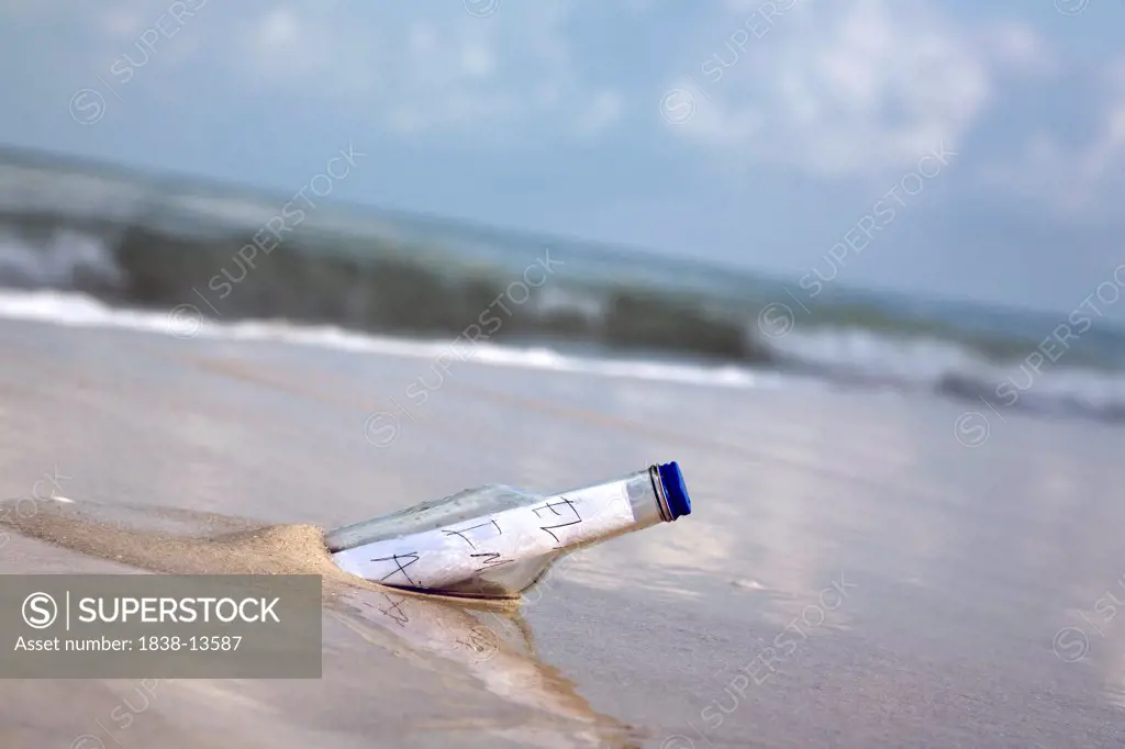 Message in Bottle at Water's Edge