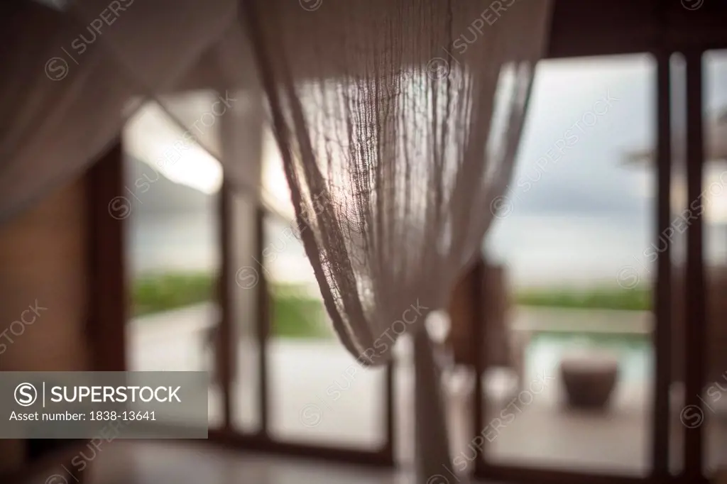 Mosquito Netting Over Bed in Hotel Room, Vietnam