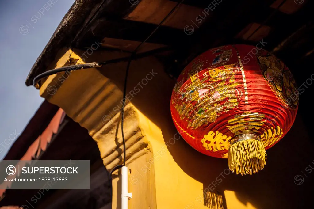 Red Paper Lantern Hanging Under Building Eave, Hoi An, Vietnam