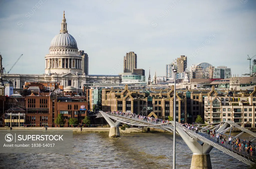 Millennium Footbridge over River Thames, and St. Paul's Cathedral, London, England, UK