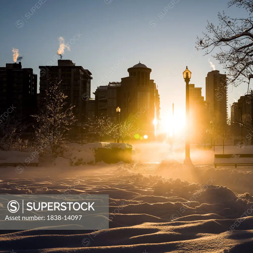 Sun Shining Through Snowy Cityscape, Vancouver, Canada
