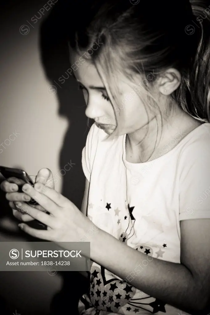 Young Girl Using iPod