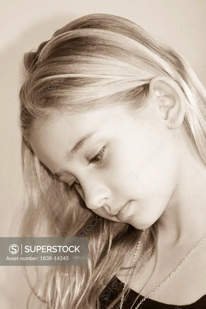 Young Blonde Girl Looking Down, Portrait