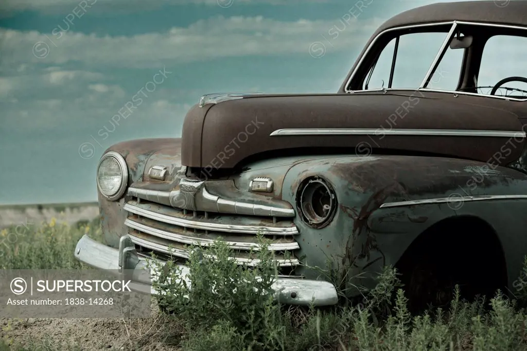 Old Abandonded Car in Field, Detail, Badlands National Park, South Dakota, USA