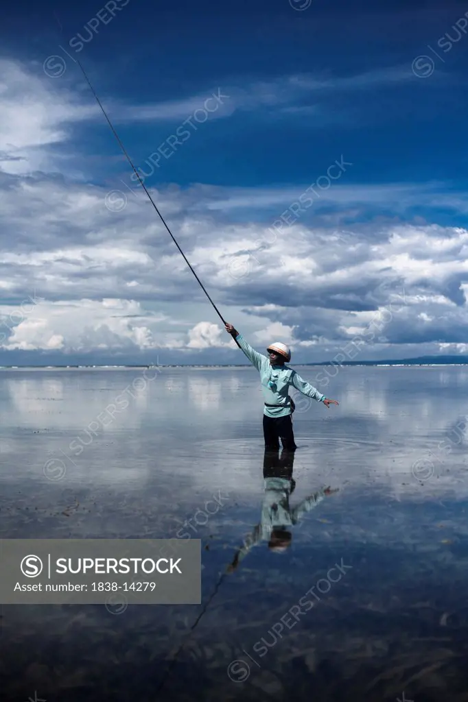 Man Fishing in Shallow Water, Bali, Indonesia
