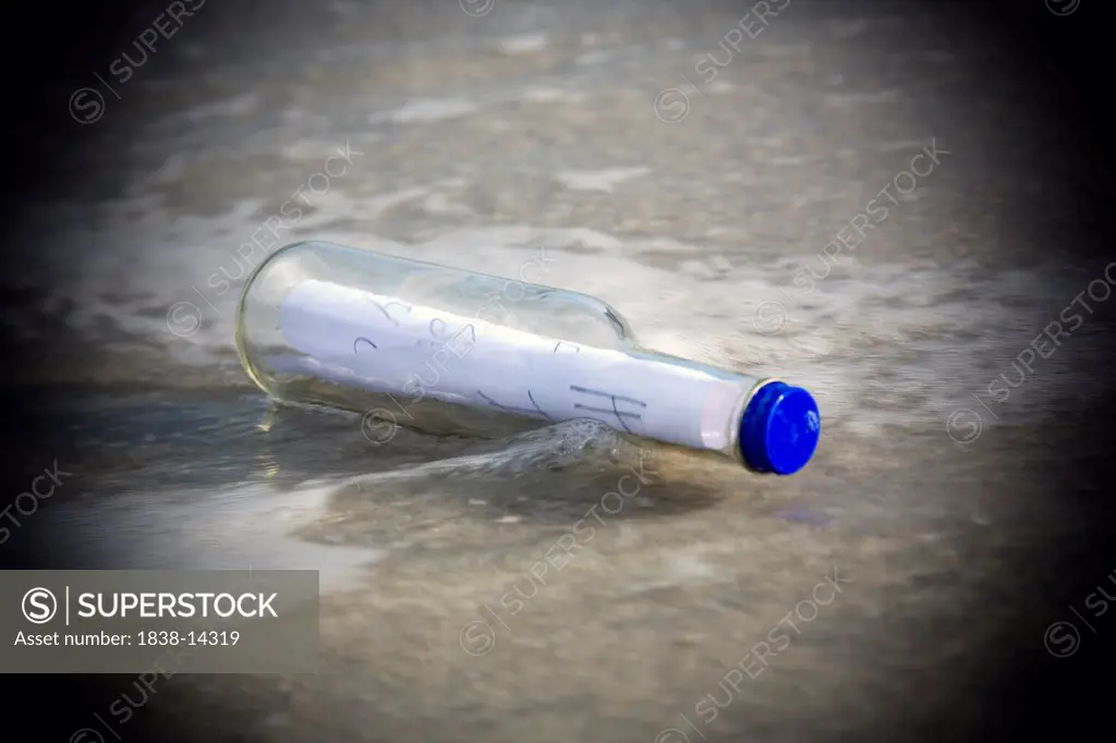 Message in Bottle on Beach