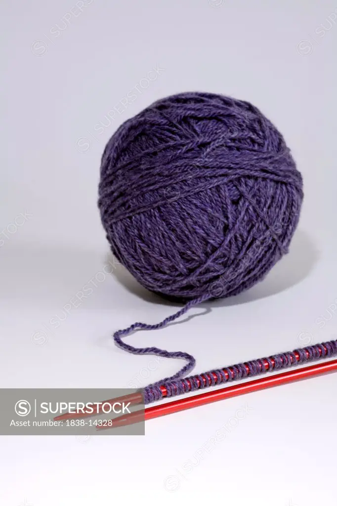 Ball of Yarn and Knitting Needles