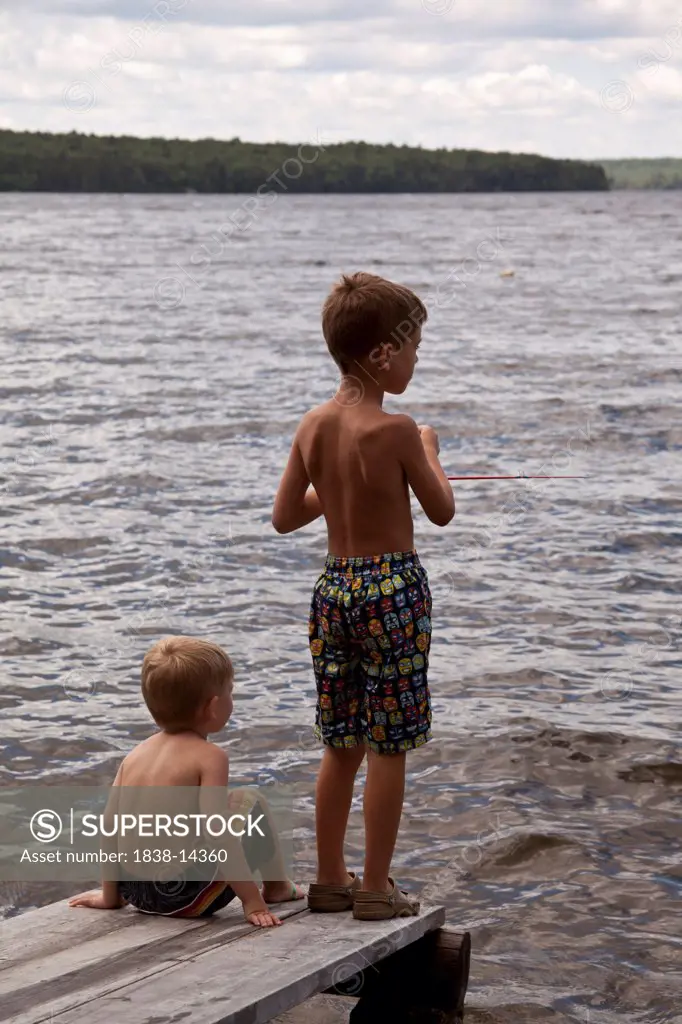 Two Boys Fishing on Dock