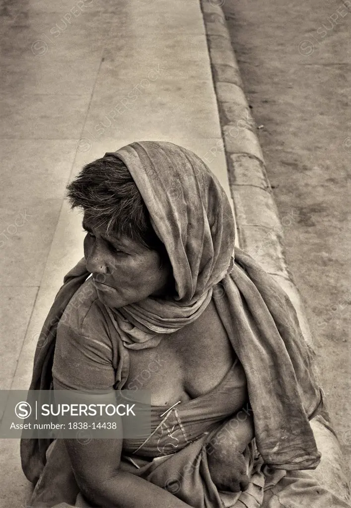 Woman Beggar on Sidewalk, India
