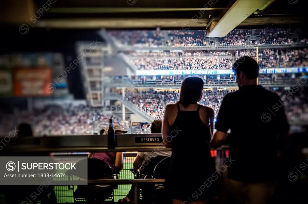 Couple at Baseball Game, Rear View Silhouette, Yankee Stadium, Bronx, New York City, USA