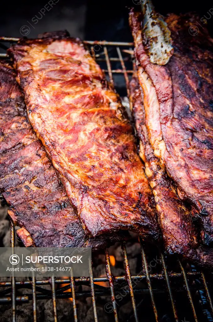 Barbecue Racks of Ribs on Grill