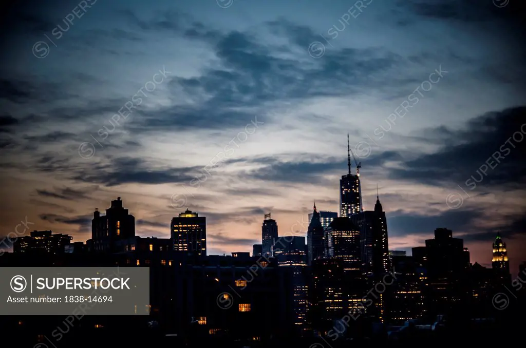 Illuminated Downtown Manhattan Skyline at Dusk as Viewed from Brooklyn, New York City, USA