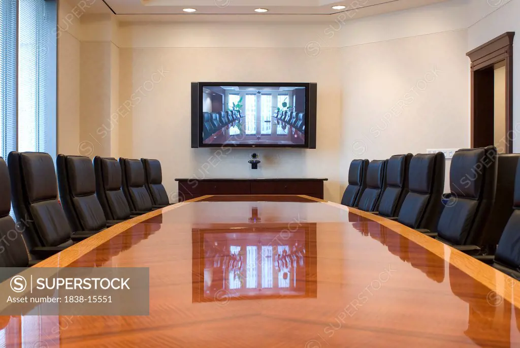 Conference Room with Video Communication Screen