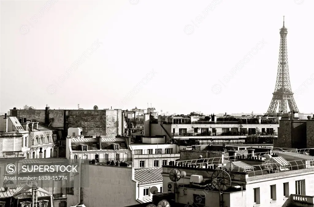 View of Rooftops with Eiffel Tower in Background, Paris, France