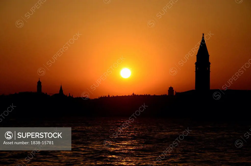 Silhouette of Buildings and Water at Sunset, Venice, Italy