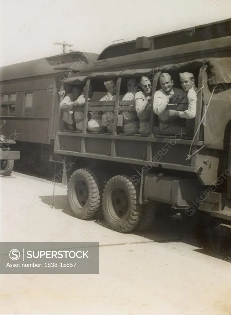Group of Soldiers on Truck, Awaiting Departure for East Coast USA with Eventual Departure by Ship to Europe, WWII, 2nd Battalion, 389th Infantry, US Army Military Base Indiana USA