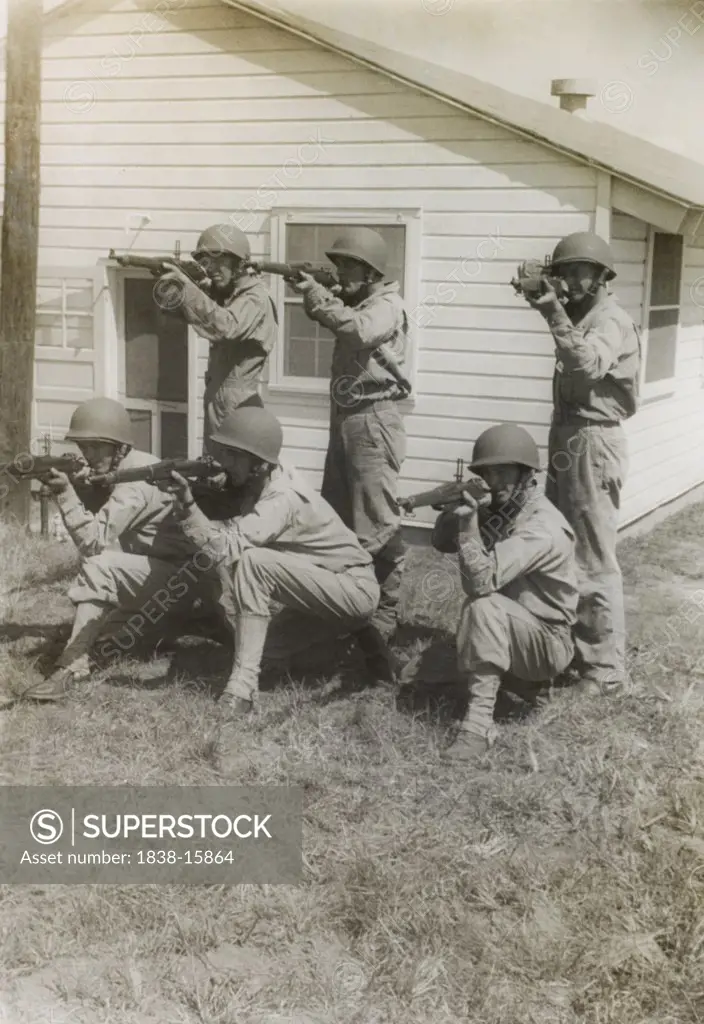 Group of Soldiers Displaying Proper Shooting Position During Training Session, WWII, 2nd Battalion, 389th Infantry, US Army Military Base Indiana, USA, 1942