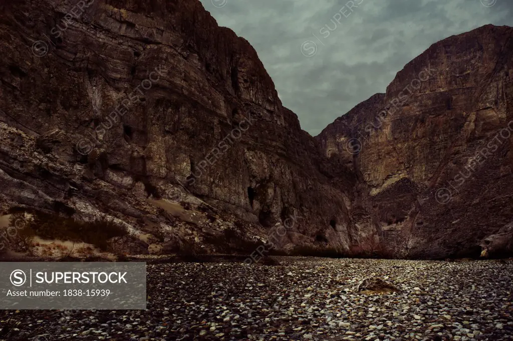 River Bed with Mountain Cliffs in Background, Texas, USA