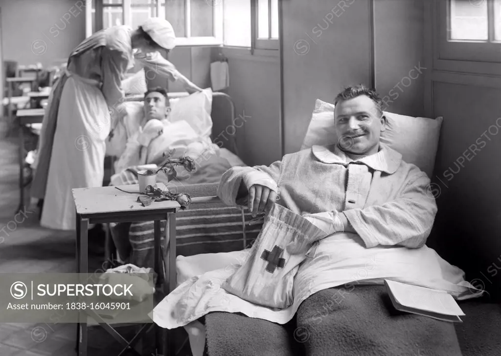 American Soldier with American Red Cross Comfort Bag in the American Military Hospital No. 1, which is supported by the American Red Cross, Neuilly, France, Lewis Wickes Hine, American National Red Cross Photograph Collection, June 1918