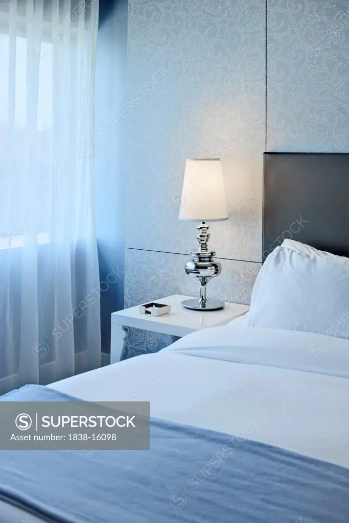 Hotel Bed and Lamp