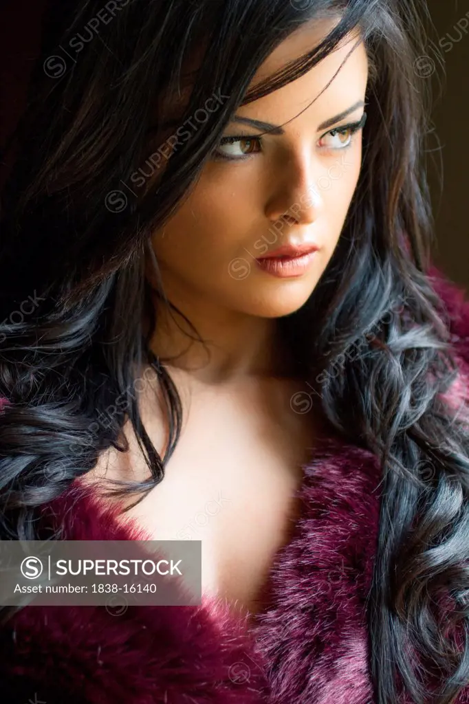 Attractive Young Woman Wearing Purple Fur Stole
