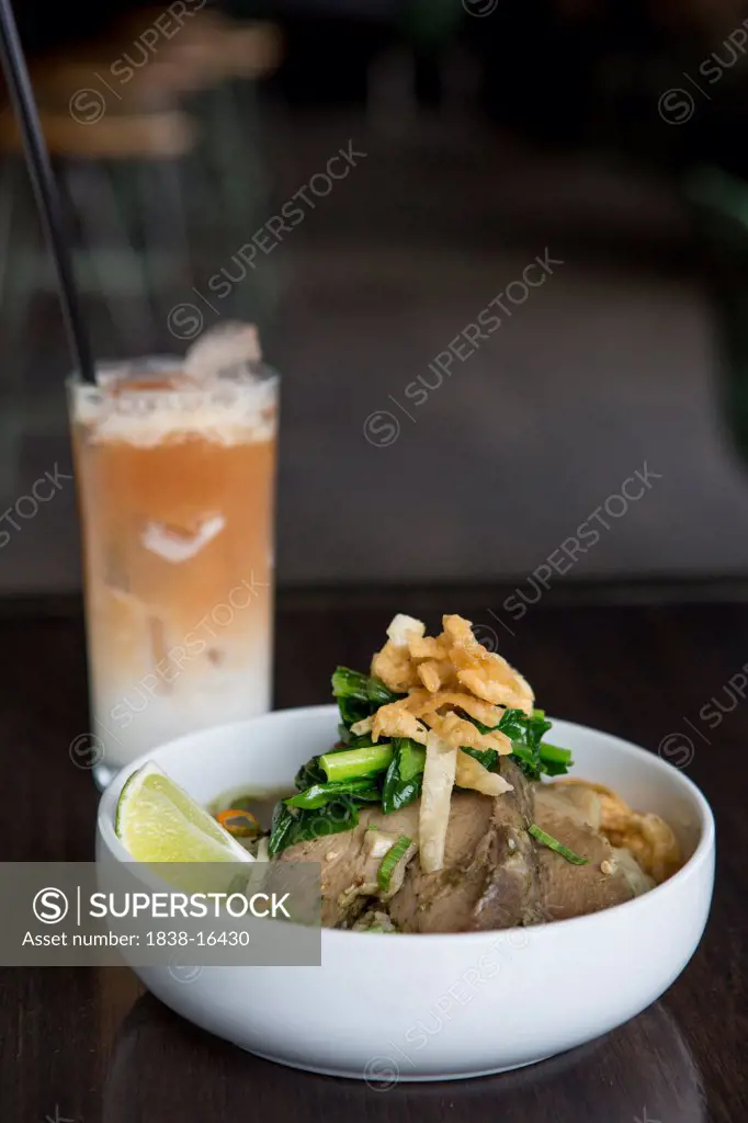 Bowl of Pork Belly and Noodles with Thai Tea