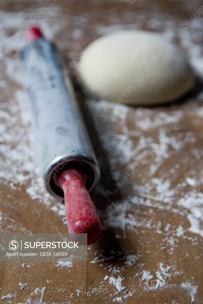 Red Rolling Pin and Dough