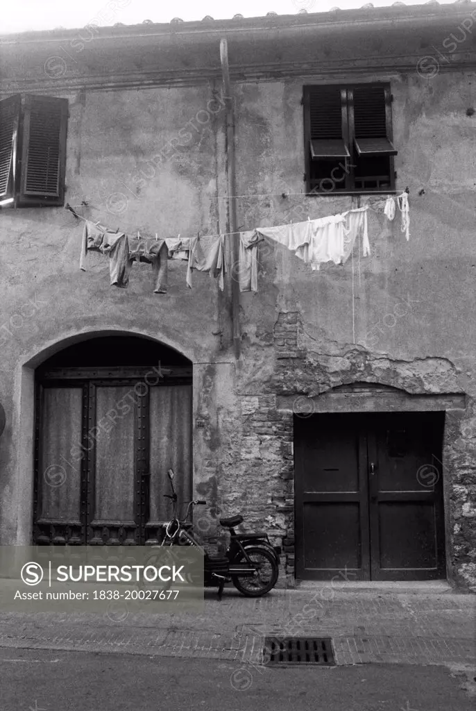Laundry Hanging on Clothesline in front of Home, San Gimignano, Italy