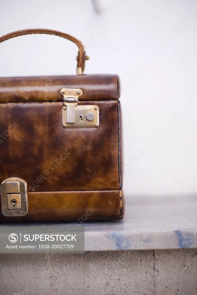 Leather Briefcase on Marble Counter