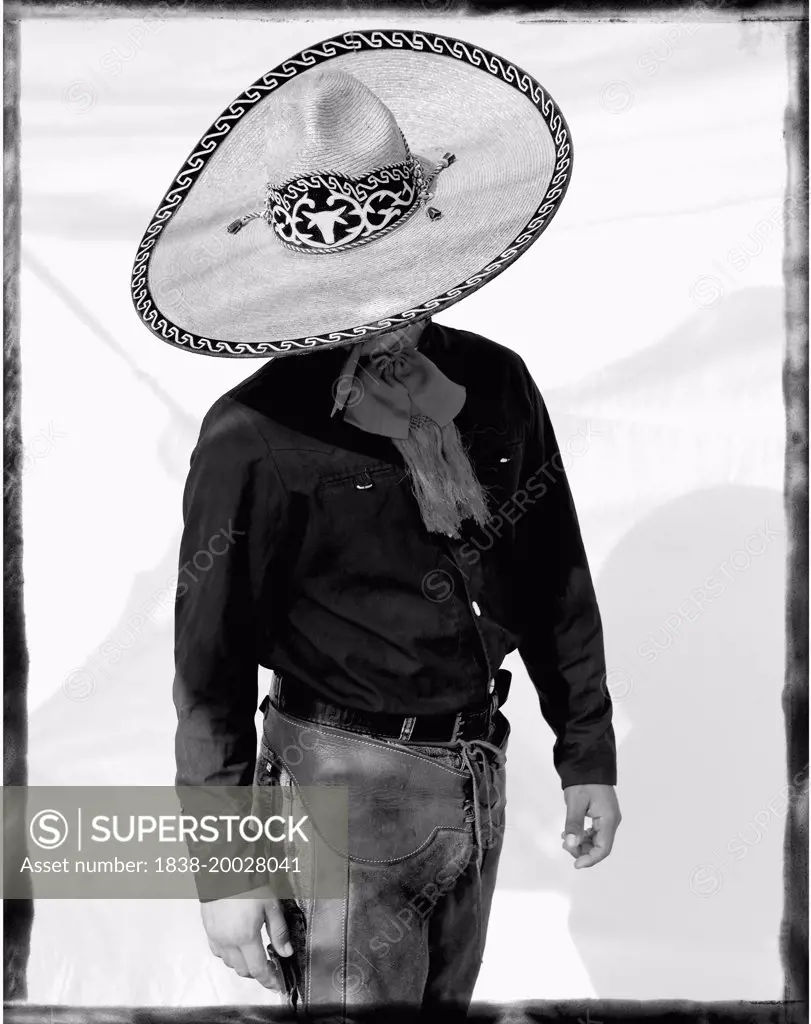 Mexican Cowboy With Large Brim Hat Looking Down