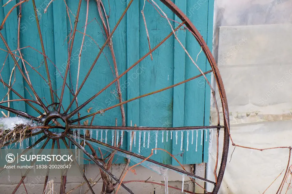 Old Wagon Wheel with Icicles
