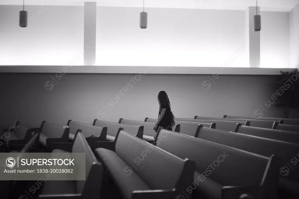 Woman Walking Down Church Aisle