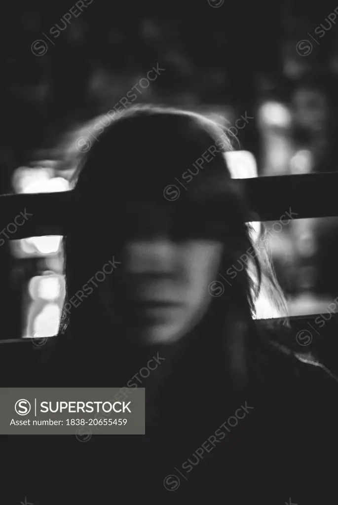 Dark Blurred Portrait of Young Woman
