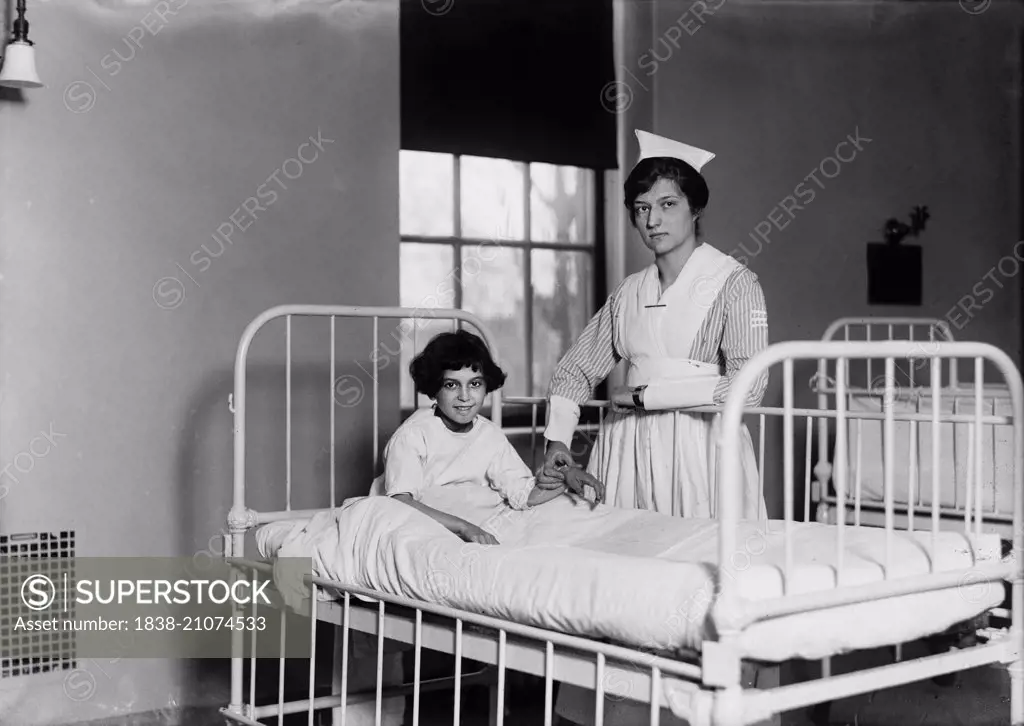 Nurse Checking Child's Pulse in Hospital, Portrait, circa 1915