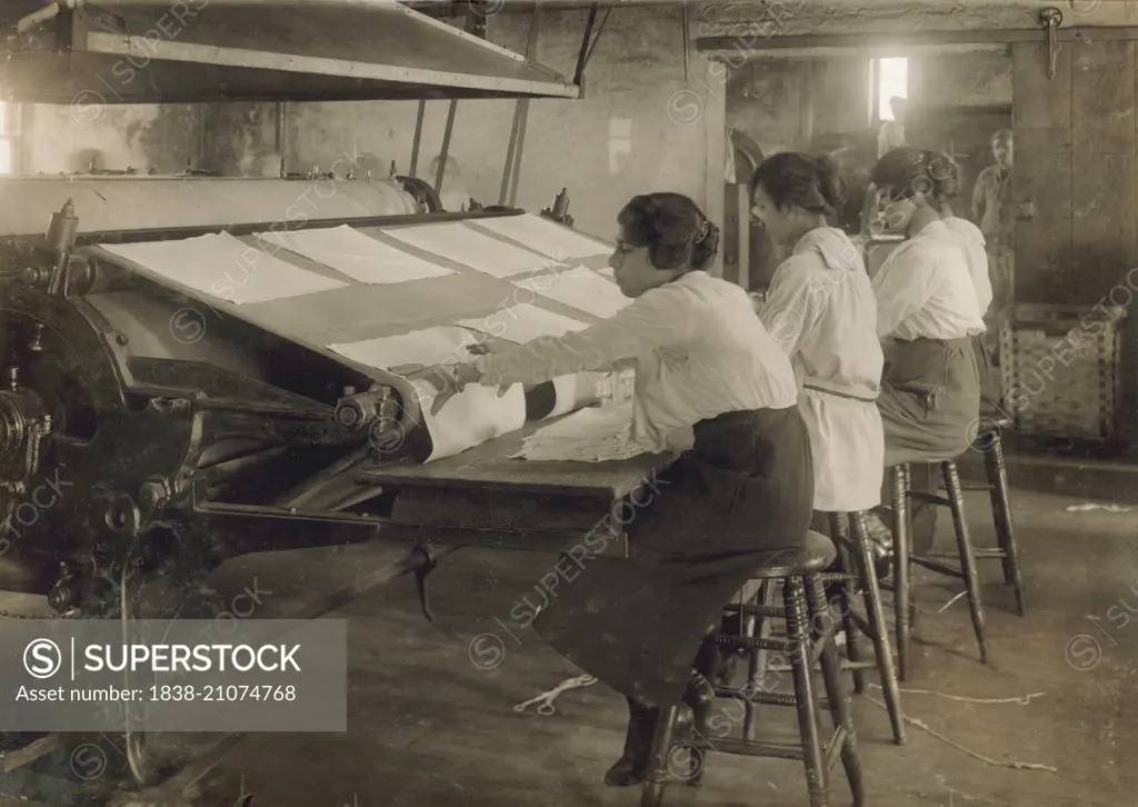 Three Young Teen Girls Working at Mangle at Bonanno Laundry, Boston, Massachusetts, USA, circa 1917