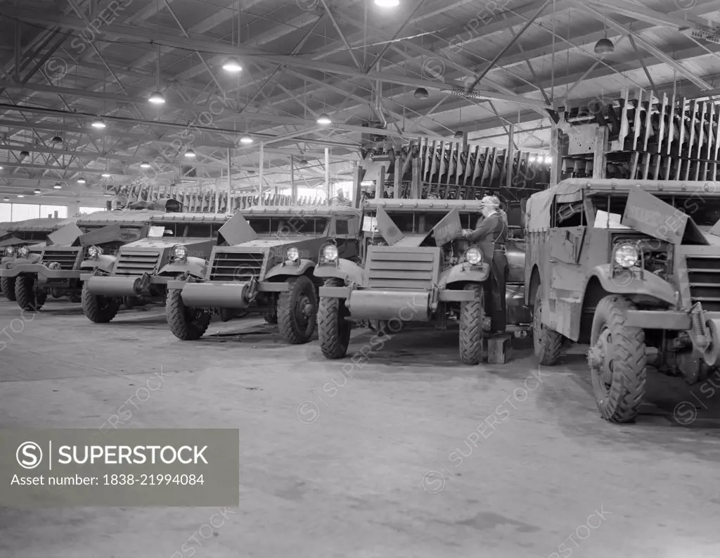 Army's Half-Track Scout Cars Ready for Delivery from Factory Converted to War Production, White Motor Company, Cleveland, Ohio, USA, Alfred T. Palmer for Office of War Information, December 1941